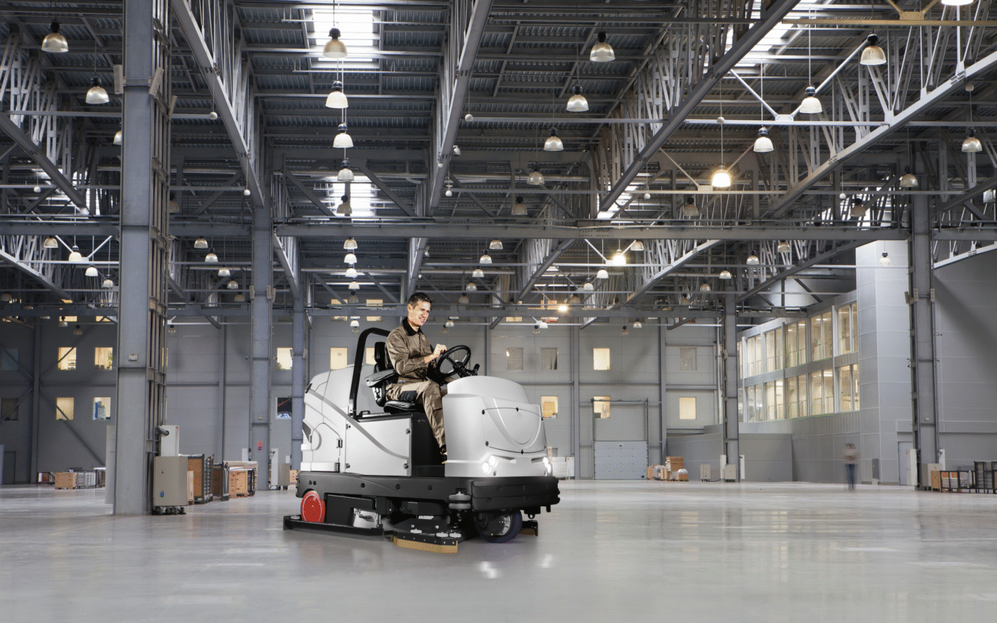 C130 Scrubber Dryer cleaning in a warehouse